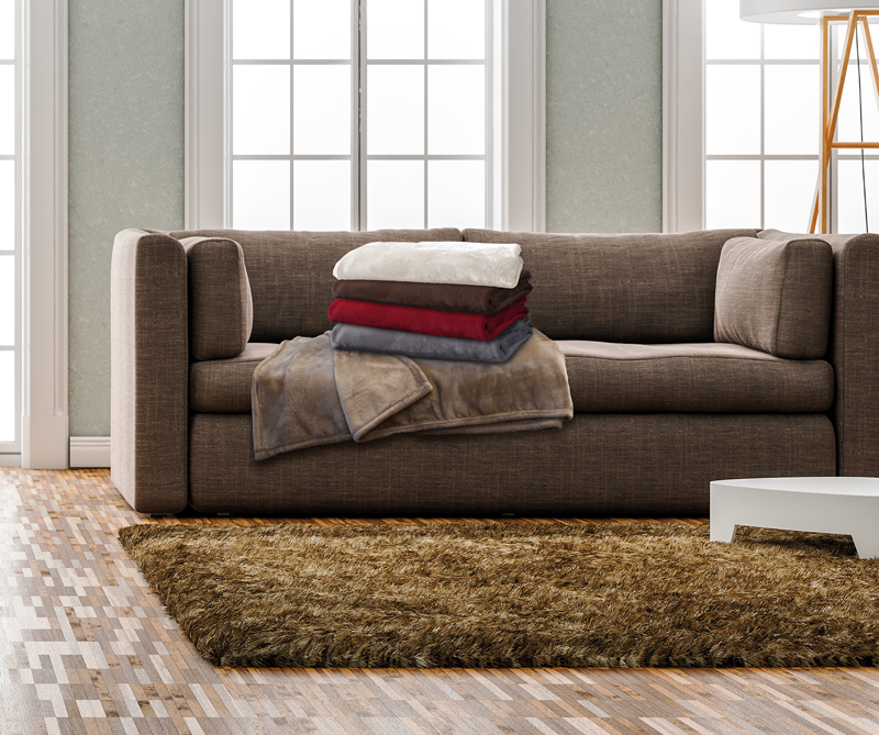 flanelldecken-sofa-milieu Braune Flanell Wohndecke von KBT 150x200cm Sofa Milieu